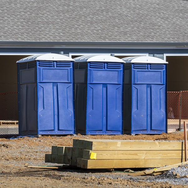 what is the cost difference between standard and deluxe porta potty rentals in Bass Lake Indiana